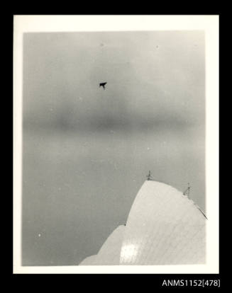 Hang glider flying above the Sydney Opera House