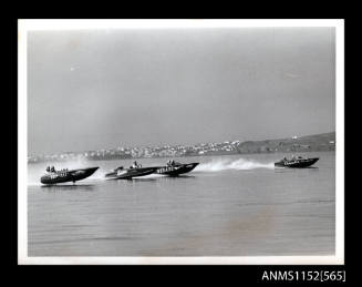 The four racing boats at speed