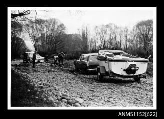 A Ford Falcon Station wagon with boat trailer carrying a jet boat