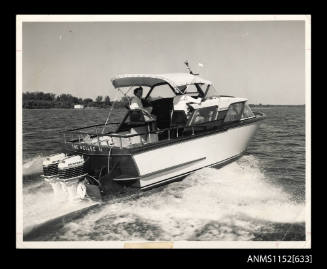 AZLIEE II Trojan  flying bridge cruiser powered by twin 45 horse power Mercury outboard engines