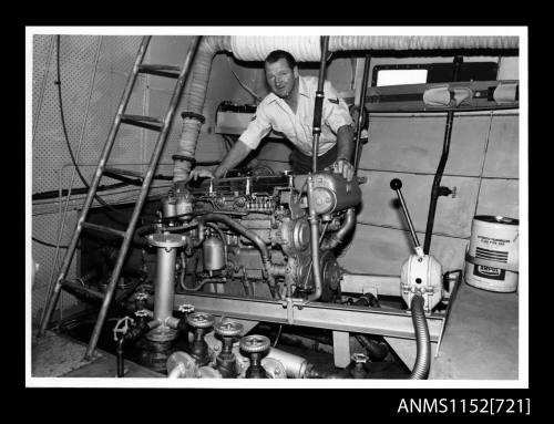 The policeman with one of the patrol boats 6-cylinder diesel engines