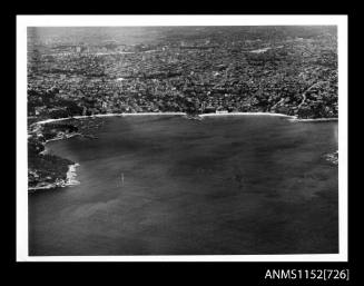 Aerial view of harbour in foreground and housing area in background