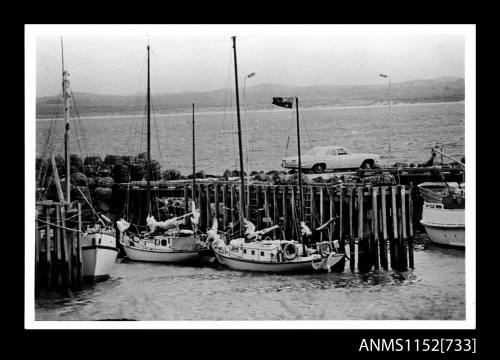 Commercial fishing boat moored at jetty