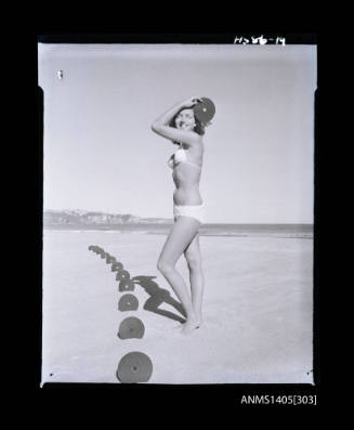 Negative depicting a woman modelling swimwear