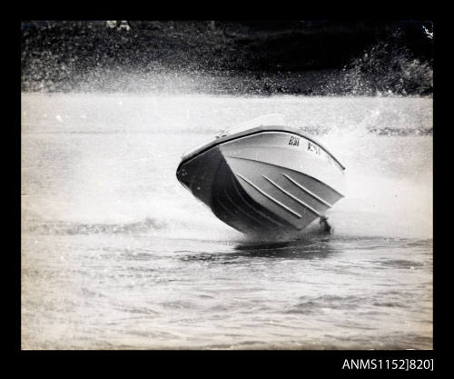 Power boat EG 361 at speed and almost clear of water