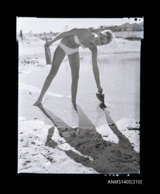 Negative depicting a woman modelling swimwear