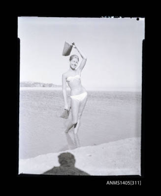 Negative depicting a woman modelling swimwear