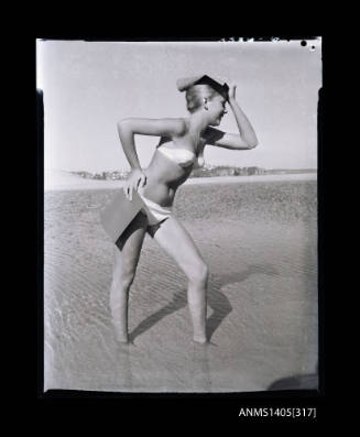 Negative depicting a woman modelling swimwear