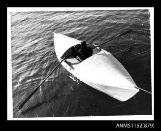 The enclosed rowing boat of fibre glass construction