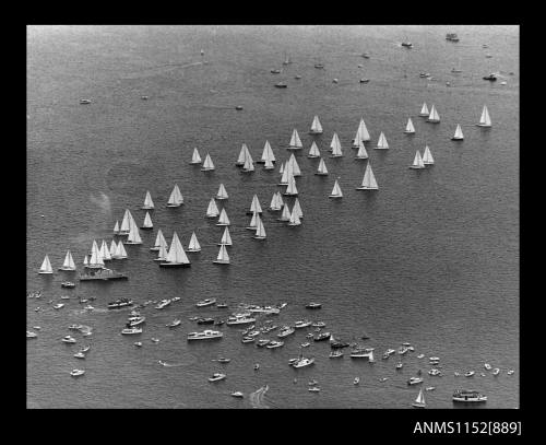 The image of aerial photograph of the start of a major sailing boat race with about 50 competitors