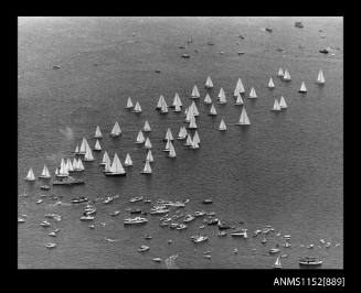 The image of aerial photograph of the start of a major sailing boat race with about 50 competitors