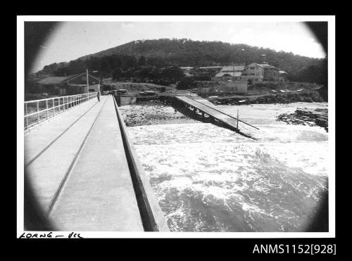 The image of long boat ramp with high access road for tidal conditions