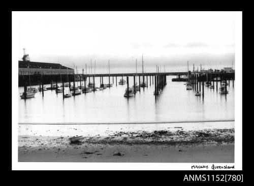 Boats moored at low tide MacKay Queensland