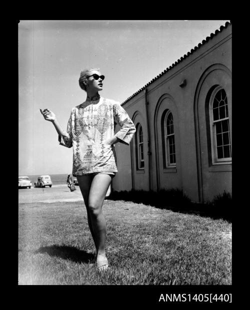 Model wearing embroidered beach set at Bondi Pavilion