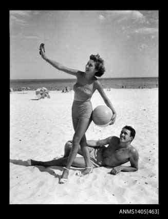 Couple modelling swimwear on Bondi Beach