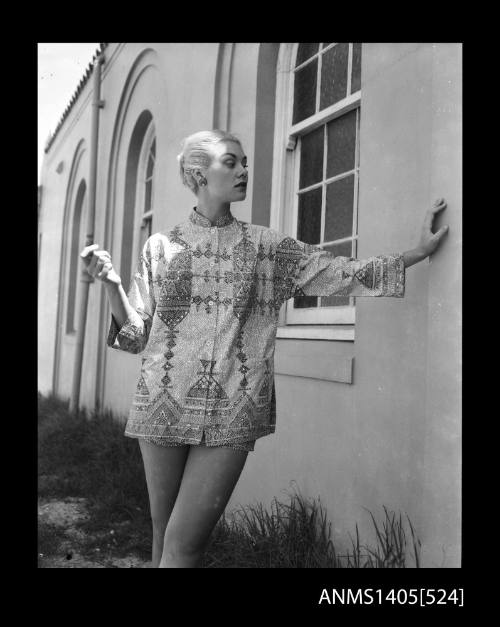 Model in patterned jacket at Bondi Pavilion