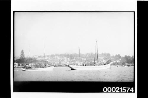 Two-masted schooners at anchor