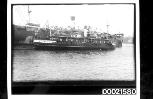 Merchant steamship in WWI dazzle camouflage being berthed in Woolloomooloo