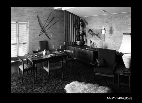 Negative depicting a dining suite and armchair