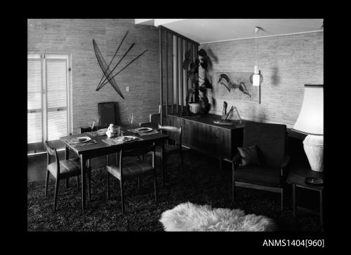 Negative depicting a dining suite and armchair