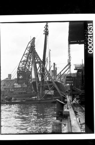 Floating crane TITAN being used to unload cargo from ESSEX, Jones Bay wharf, Pyrmont