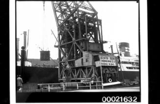 TITAN floating crane being used to unload cargo from ESSEX, Jones Bay wharf Pyrmont