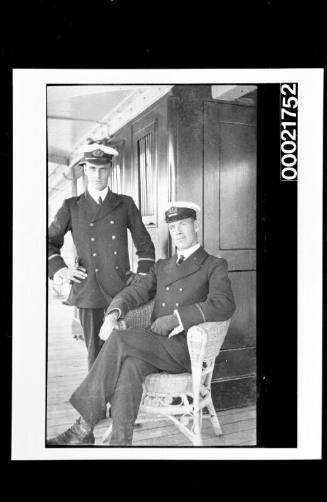 Two merchant mariners on deck of a steamship