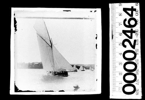 Cutter on Sydney Harbour, most likely ERA, with the number '27' printed on the topsail