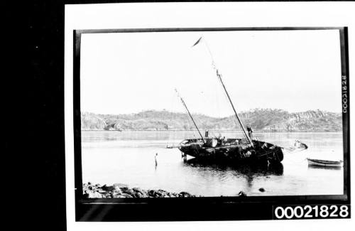 Pearling lugger aground at low water, Broome