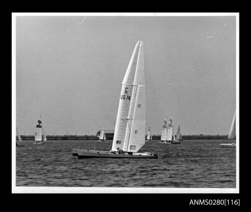 Port view of catamaran PATIENT LADY III under sail