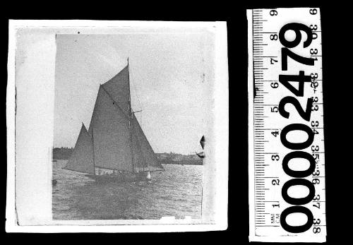 Starboard view of a yawl under sail on Sydney Harbour, New South Wales