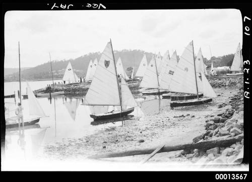 Veejays sailing dinghies beached