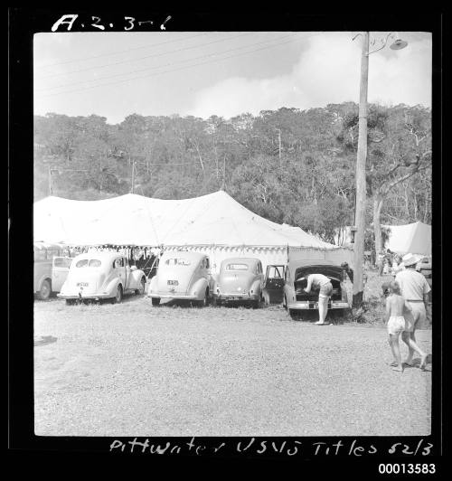 Cars parked near beach in Pittwater