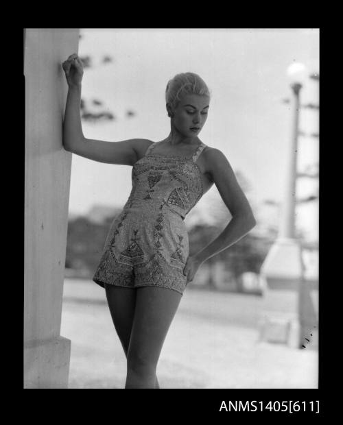 Model in patterned swimsuit at Bondi