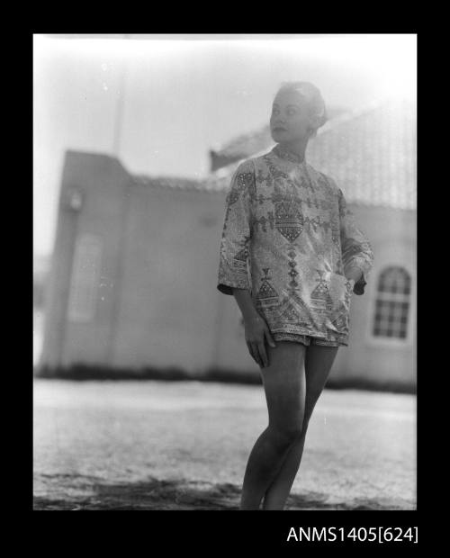 Model wearing beach set outside Bondi Pavilion