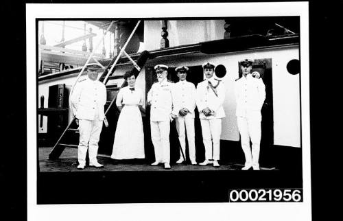 Group of unidentified merchant marine officers and a woman on board MERSEY