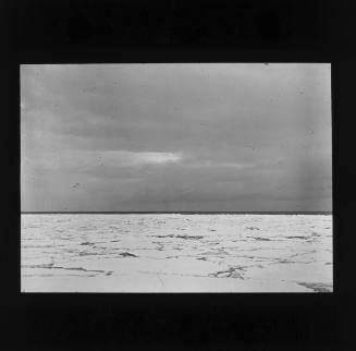 Antarctic landscape of pack ice, ocean and sky