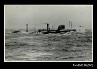 Unidentified sinking cargo sinking in heavy seas