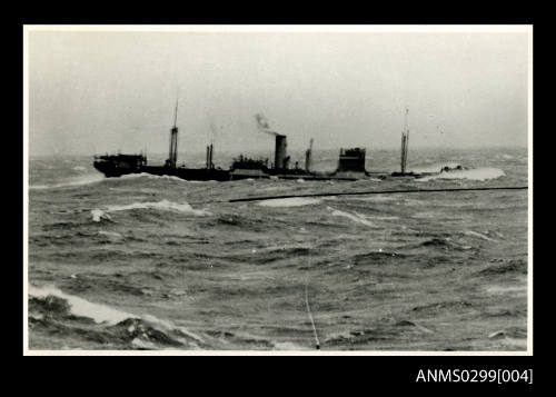 Unidentified sinking cargo sinking in heavy seas