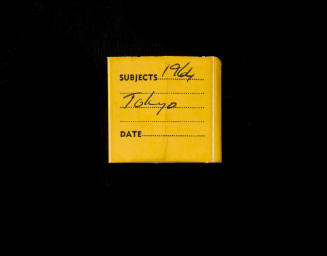 Kodak sliding tab for box of  Uncut roll of film marked with 1964 - 5 / Suva Cres: / Shark fishing / surfers