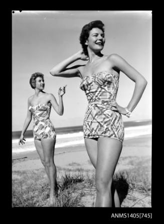 Negative depicting two women modelling swimwear