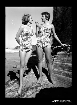 Negative depicting two women modelling swimwear