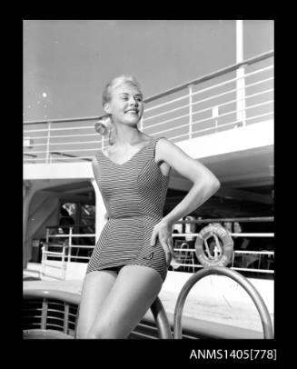 Negative depicting a woman modelling beach wear