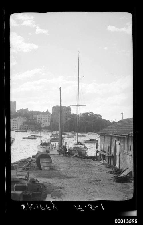 SKIPPY on Sydney Harbour..general boatshed scene possibly Mosman Bay