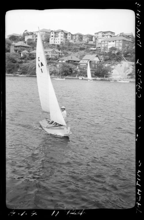 Yachting World Cadet Dinghy on Sydney Harbour