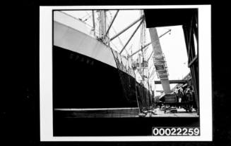 Unloading aeroplane from OPAWA, Darling Island