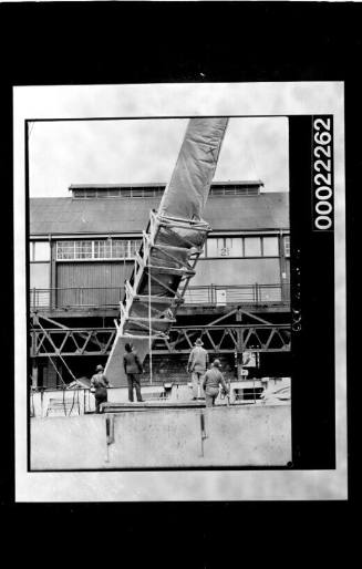 Unloading aeroplane from OPAWA, Darling Island