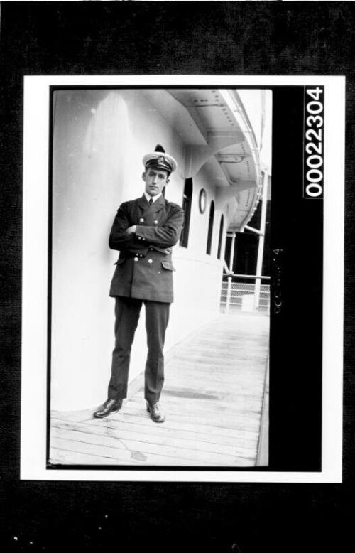 Ships and steamer crews, man in uniform standing