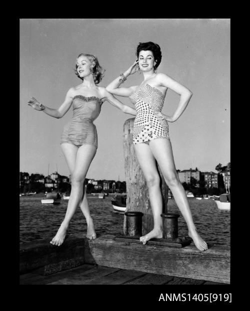 Negative depicting two women modelling swimwear