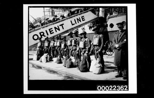 Australian troops on wharf, gangway reads `ORIENT LINE'